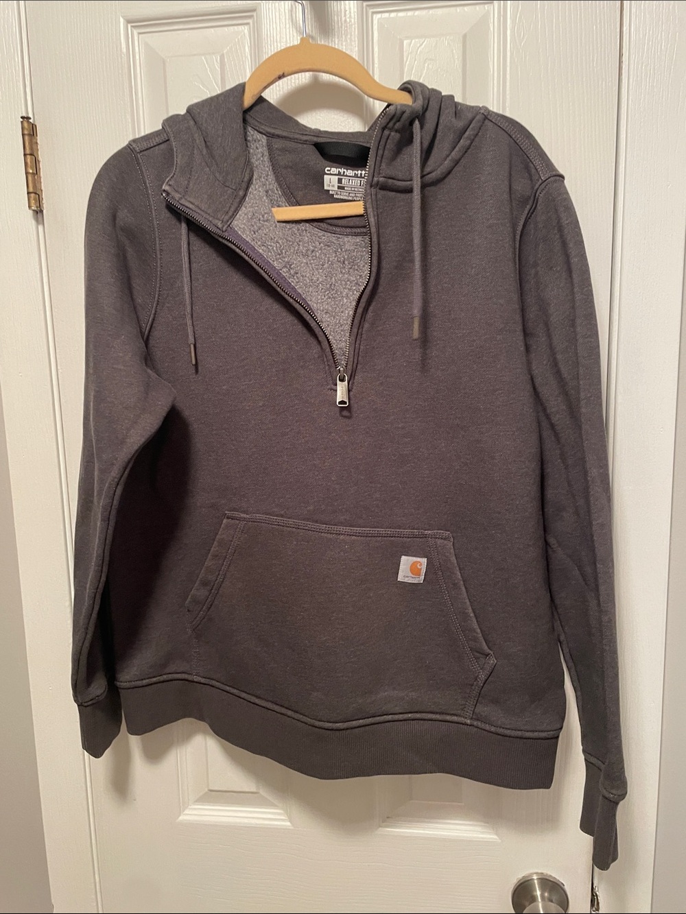 Carhartt half zipped size large relax fit definitely could be unisex.
